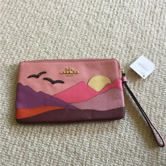 Coach Sunset Landscape Wristlet in Pink and Purple